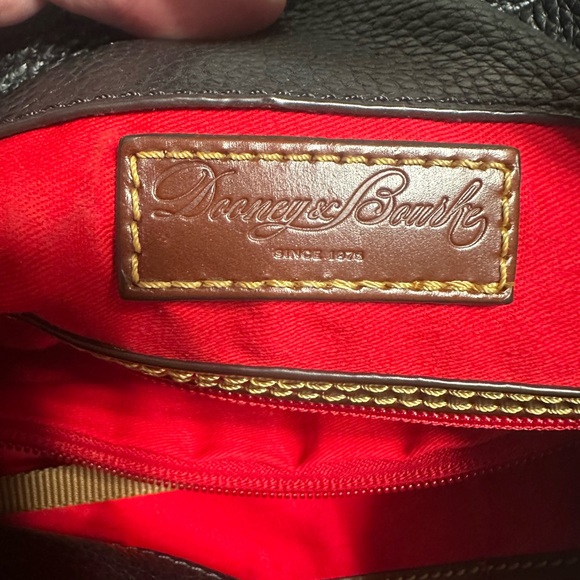 Dooney & Bourke black & brown leather shoulder bag with gold “C” ring/clasp. - Picture 7 of 13